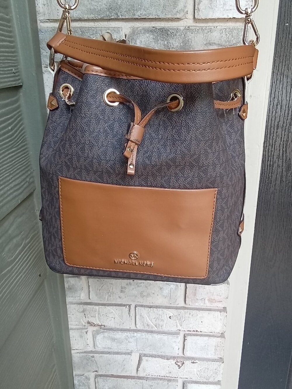 The Michael Kors Maeve Medium Signature Logo Bucket Bag